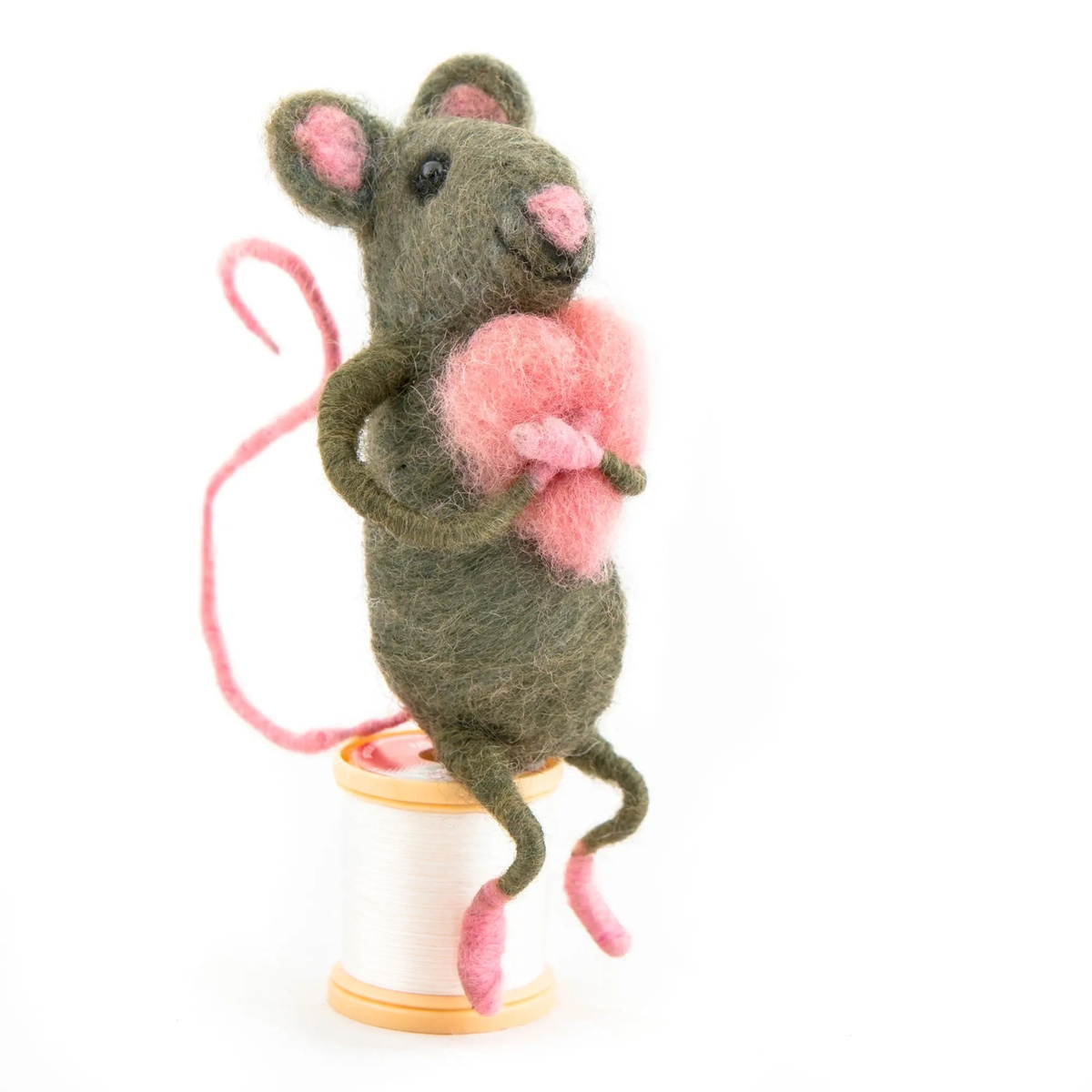 Sitting Hugging Heart Mouse, a handmade felt mouse hugging a small pink heart, by Sew Heart Felt
